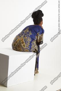 Dina Moses African Woman Sitting Pose
